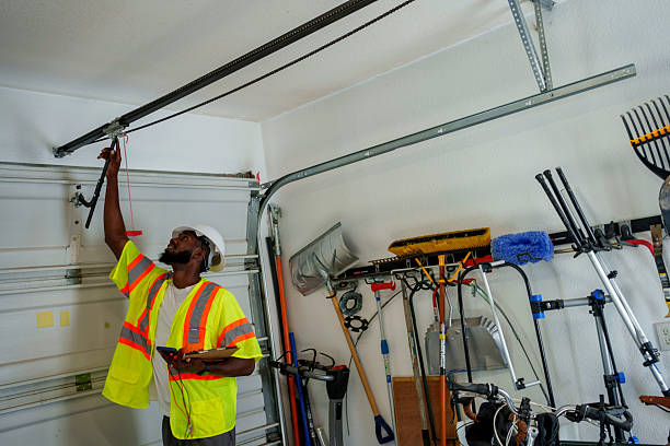 Professional Garage Door Panel Replacement technician working in Piney Point Village, TX